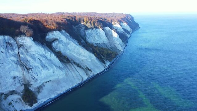 The White Cliffs of Denmark, also known as M&oslash;ns Klint. A Chalk stone cliff overlooking the Baltic sea. Aerial footage.