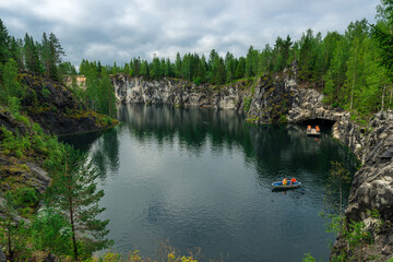 Boats on Marble Lake in Ruskeala Mountain Park in Karelia Russia
