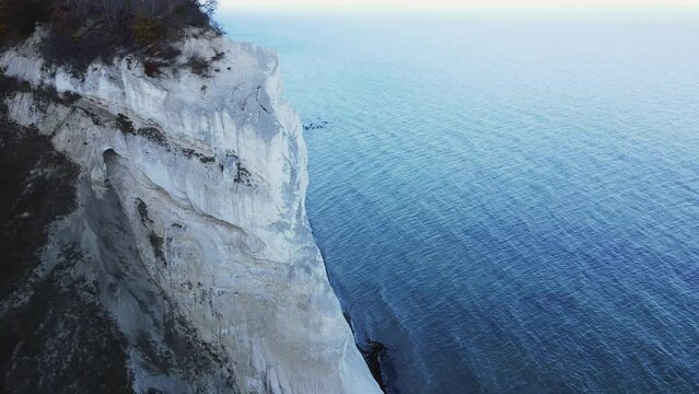 The White Cliffs of Denmark, also known as M&oslash;ns Klint. A Chalk stone cliff overlooking the Baltic sea. Aerial footage.