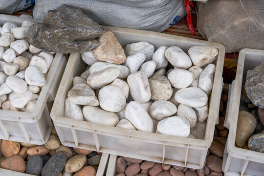 Close-up of various rocks for sale in an aquarium shop
