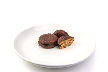 chocolate cookies on white dish