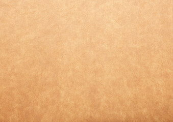 Texture of old organic cardboard, beige paper, background for design, copy space. Recyclable material, has inclusions of cellulose