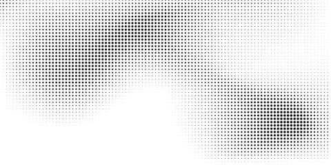Fototapeta premium Halftone dotted background. Black dots in modern style on a white background.