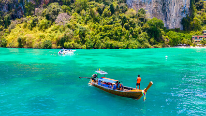 Fototapeta na wymiar High angle, beautiful sea, and tourists boats at Phi Phi Island, Phuket, Thailand