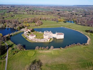 Aerial drone. Leeds Castle in Maidstone, Kent, England. It is built on islands in a lake formed by the river Len.