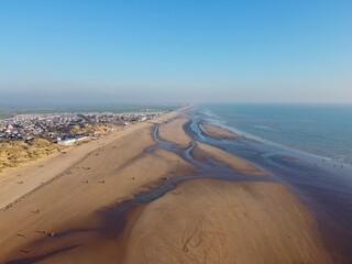 Aerial drone. Camber Sands in East Sussex. Popular seaside destination with large sandy beach and...