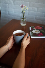 woman with cup of tea