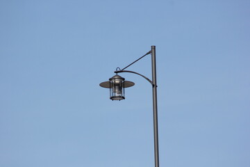 Urban light with blue sky background - Electric energy technologies
