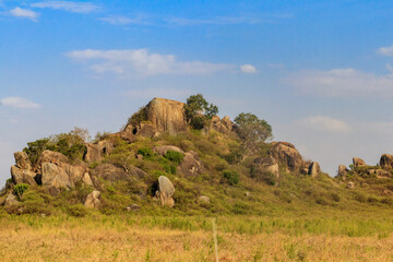 View of the kopje rocks in endless savannah in Serengeti National Park, Tanzania