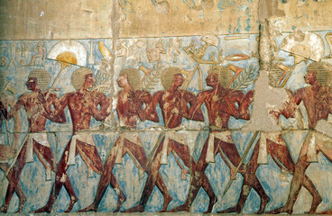 Coloured wall relief of a festival procession from the Temple of Hapshepsut, Egypt
