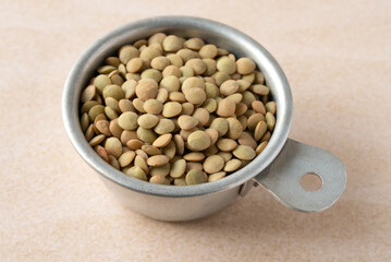 Uncooked Lentils in a Measuring Cup