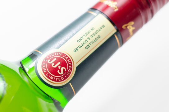 LONDON, UNITED KINGDOM -  FEBRUARY 04, 2022 Characteristic green bottle of Jameson Irish Whiskey distilled at the New Midleton Distillery in County Cork, Irland