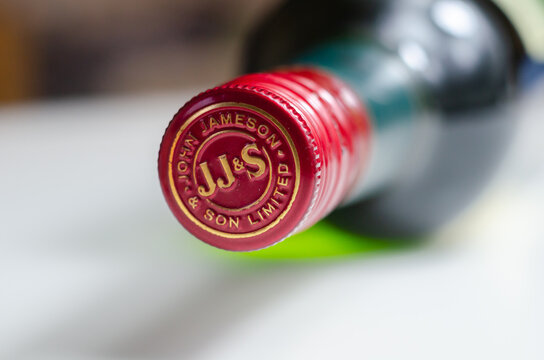 LONDON, UNITED KINGDOM -  FEBRUARY 04, 2022 Characteristic green bottle of Jameson Irish Whiskey distilled at the New Midleton Distillery in County Cork, Irland