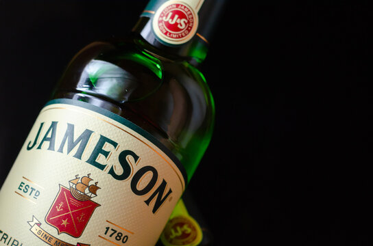 LONDON, UNITED KINGDOM -  FEBRUARY 04, 2022 Characteristic green bottle of Jameson Irish Whiskey distilled at the New Midleton Distillery in County Cork, Irland