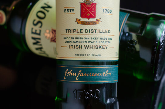 LONDON, UNITED KINGDOM -  FEBRUARY 04, 2022 Characteristic green bottle of Jameson Irish Whiskey distilled at the New Midleton Distillery in County Cork, Irland