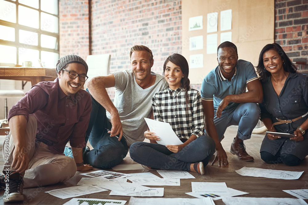 Poster alone we are one drop, together we are an ocean. shot of a team of entrepreneurs collaborating and s