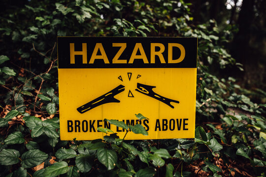 Yellow Hazard Sign Warning Broken Limb Above