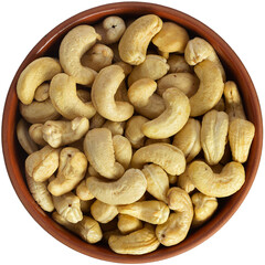 Cashew cheese in a brown ceramic bowl. Isolated close-up photo of food close up from above on white background.