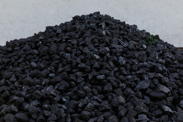 Pile of natural black hard coal for texture background. Coal energy.
