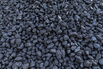 Pile of natural black hard coal for texture background. Coal energy.