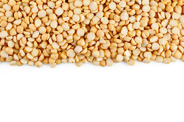 Dry Split Yellow Peas isolated in white background. Healthy Vegetarian or Vegan Food Texture.