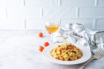 Minced beef tomato sauce pasta in a white plate