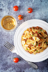 Minced beef tomato sauce pasta in a white plate