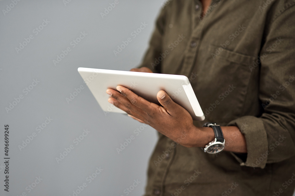 Aufkleber one tap gets you whatever info you need. studio shot of an unrecognisable businessman using a digita