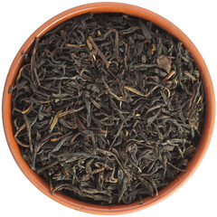 Golden Mao Feng Black Tea in a brown ceramic bowl isolated on white background. Isolated close-up photo of food close up from above on white background.