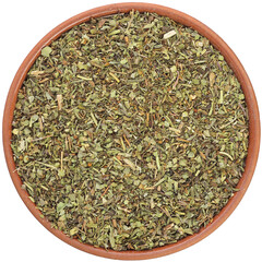 Mixture of dried herbs of the Provence in a brown ceramic bowl isolated on white background. Isolated close-up photo of food close up from above on white background.