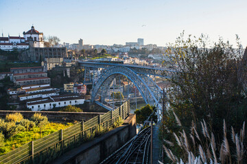 View of the Dom Luis I iron bridge over Douro river at Porto, Portugal.