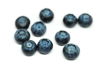 Blueberries on a white background. Signs. Healthy wholesome food. Vitamins and microelements.