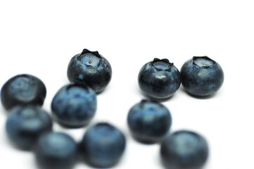Blueberries on a white background. Signs. Healthy wholesome food. Vitamins and microelements.