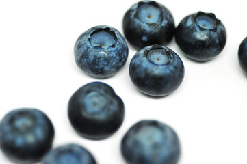 Blueberries on a white background. Signs. Healthy wholesome food. Vitamins and microelements.