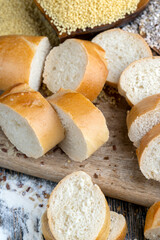 pieces of wheat baguette on a cutting board