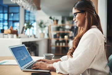 You can learn more about my business online. Shot of a businesswoman using her laptop while working...