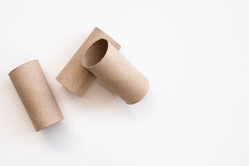 empty toilet paper rolls on white background