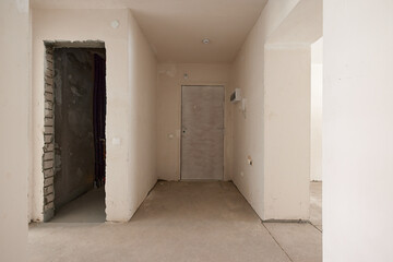 Typical rough finishing of an apartment in a new building. Real estate object