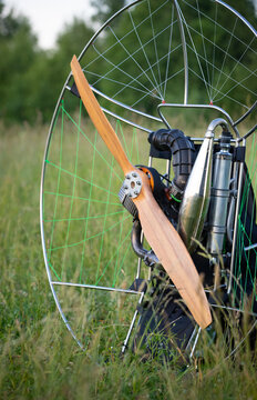 Preparing a paralet with a gasoline engine for flights. Paragliding machine for individual paragliding flights. Wing flight preparation. Extreme sports.