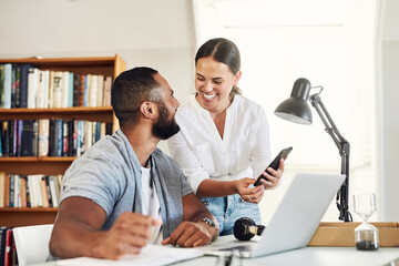 Fototapeta premium Youre so hilarious to me. Shot of a young couple spending time together.