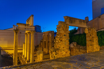 Sunset view of Portico del Foro in Merida, Spain.