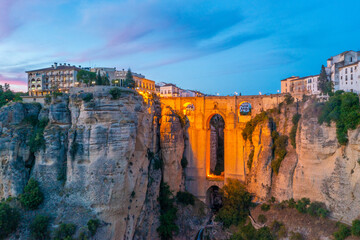 Sunset view of Puente nuevo bridge in Spanish town Ronda. © dudlajzov