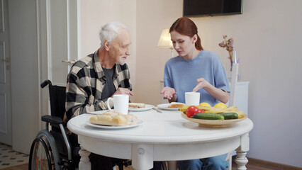 Granddaughter came to an elderly man in a gurney for breakfast