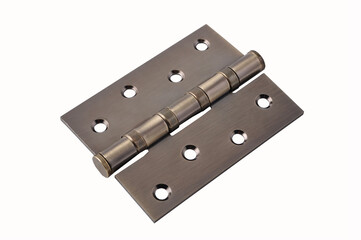 Hinge of the door. Home reparation. Door installation. Metal parts. Bronze spare parts for renovation of the door.