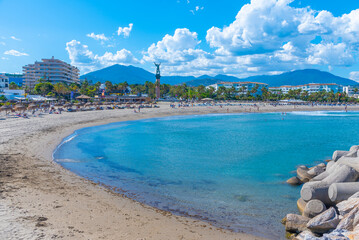 Sunny day at Puerto Banus beach at Marbella, Spain. - obrazy, fototapety, plakaty