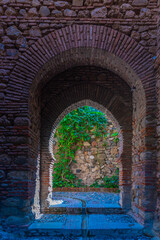 view of the main gate of the alcazaba fortress in malaga.