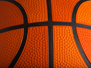 Obraz premium Macro shot. Basketball. Details. Sports games, training, professional and amateur sports, healthy lifestyle. There are no people in the photo. Advertising. Banner.