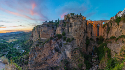 Sunset view of Puente nuevo bridge in Spanish town Ronda © dudlajzov