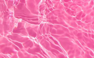 de-focused.Closeup of pink transparent clear calm water surface texture with splashes and bubbles. Trendy abstract summer nature background. for a product, advertising, text space