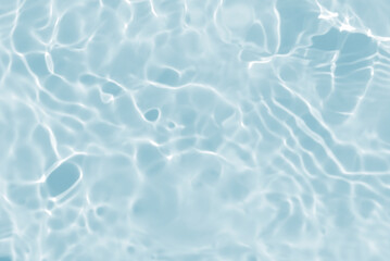de-focused.Closeup of blue transparent clear calm water surface texture with splashes and bubbles. Trendy abstract summer nature background. for a product, advertising, text space
